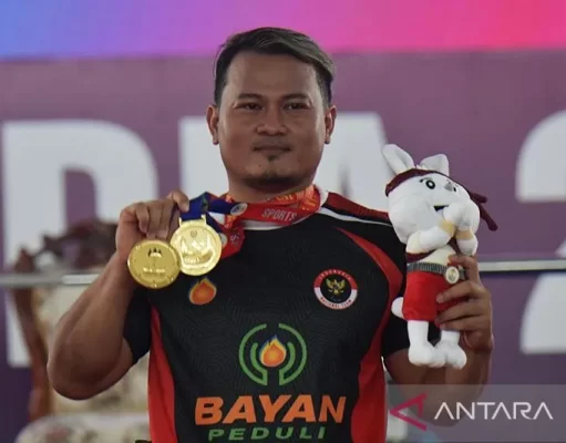 Angkat Berat Menambah 2 Medali Emas dari Atlit Margono Kelas 65 Kilogram di ASEAN Para Games