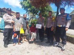 Polisi Berbagi Kasih Dengan Masyarakat Tidak Mampu