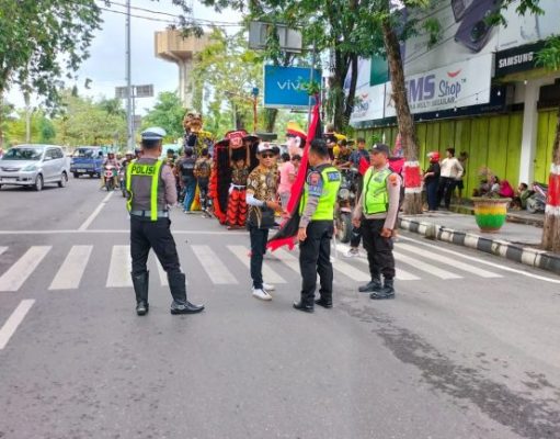 Polres Grobogan Gelar Pengamanan Kawal Pawai Barongsai