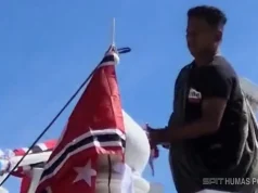 Sosok Anggota Polri yang Selamatkan Bendera Merah Putih di Tengah Kericuhan Aksi Damai Aceh