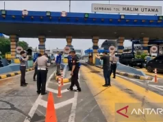 Polisi Lakukan Olah TKP Kecelakaan Beruntun di Gerbang Tol Halim